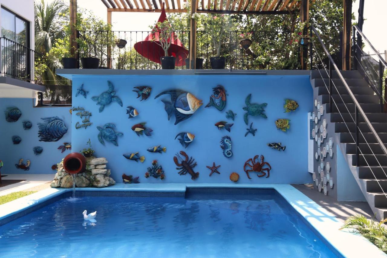מלון בקאלאר Casa Chukum מראה חיצוני תמונה The pool at the home of the artist